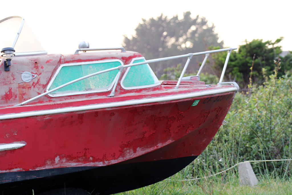 Waiting for action that may never come. A tiny boat in the off season.